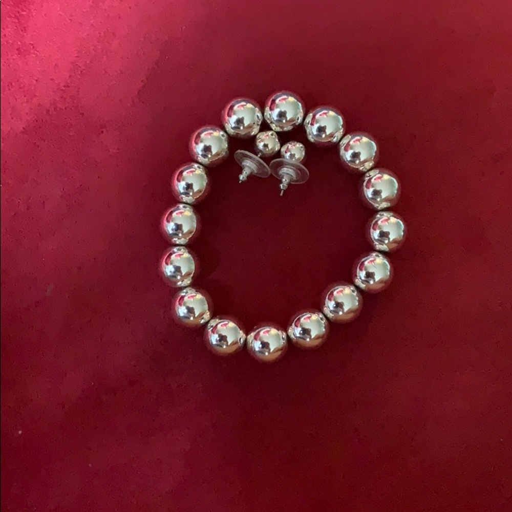 Silver beaded bracelet and matching stud earrings